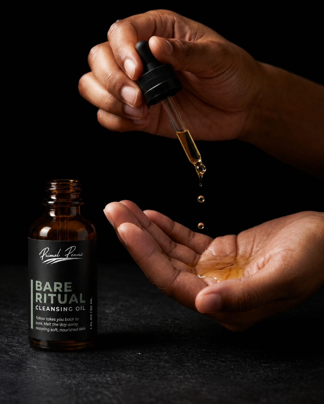 Hand holding a dropper with oil over another hand, next to a bottle labeled 'Bare Ritual Cleansing Oil' on a dark background.